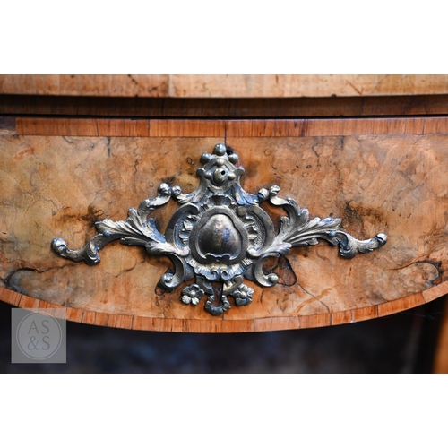 525 - A French ormolu mounted crossbanded walnut ladies bonheur de jour, late 19th century, the top with f... 