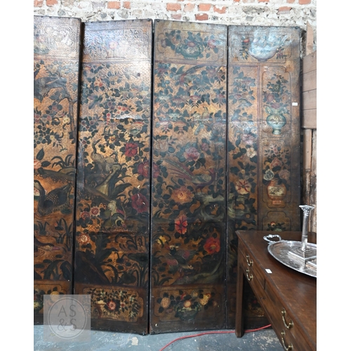 526 - A large antique continental floor standing six panel folding wood and leather screen, hand-painted p... 