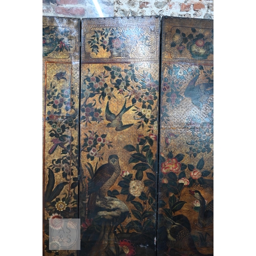 526 - A large antique continental floor standing six panel folding wood and leather screen, hand-painted p... 