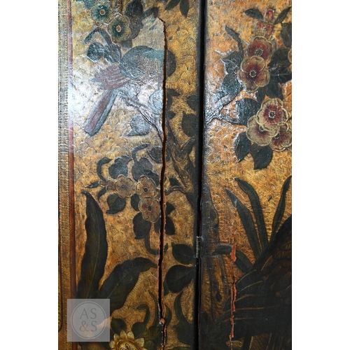 526 - A large antique continental floor standing six panel folding wood and leather screen, hand-painted p... 