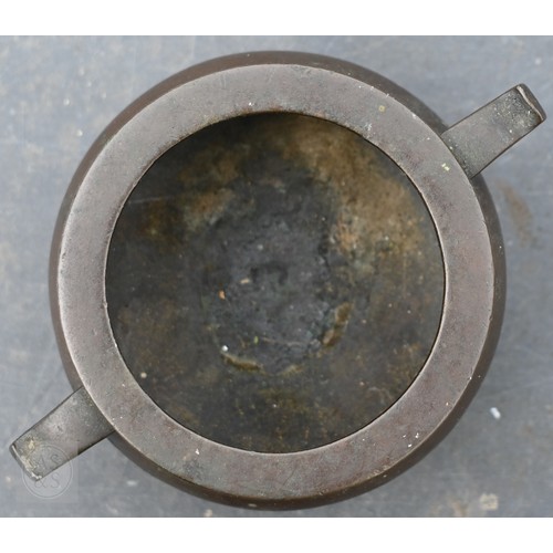 310 - A 17th/18th century Chinese bronze censer (incense burner) and original stand, the censer with compr... 