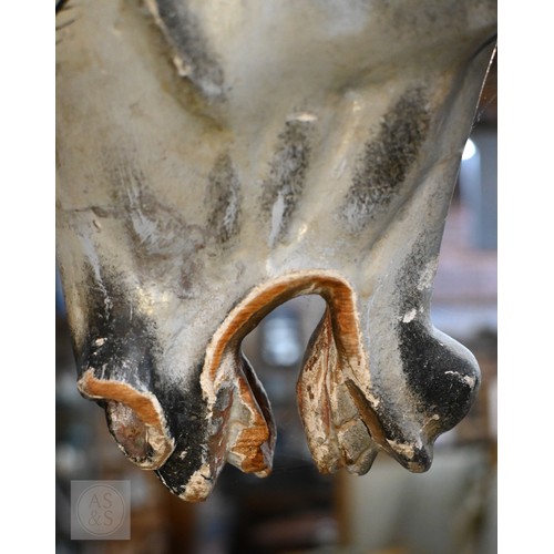 588 - An antique dapple grey painted wooden rocking horse with leather saddle, probably by FH Ayres, raise... 
