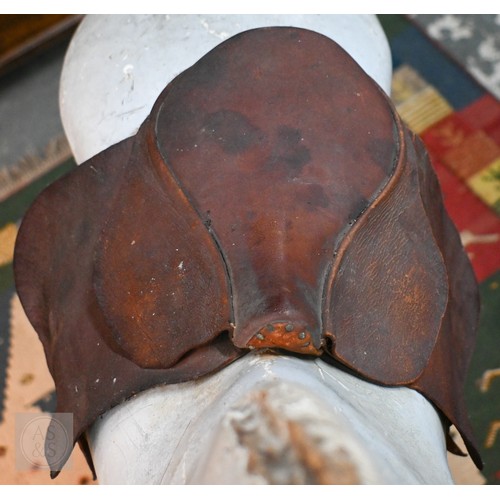 588 - An antique dapple grey painted wooden rocking horse with leather saddle, probably by FH Ayres, raise... 