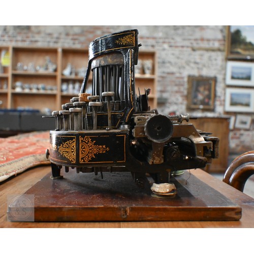 693 - A 19th Century Salter typewriter with tin cover, to/w a John Jardine (Nottingham) Bar-Let typewriter... 