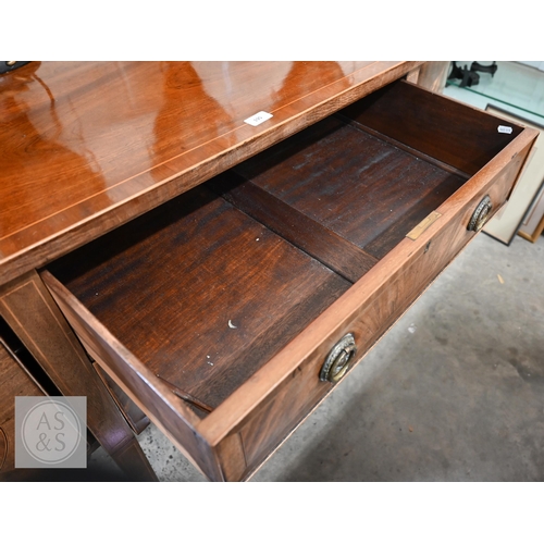 208 - An antique mahogany bowfront sideboard, two central drawers flanked by curved cupboard doors on tape... 