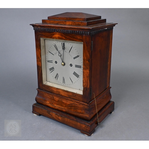 Payne, 163 New Bond Street, London, a good Regency ogee moulded rosewood cased hour repeat bracket/library clock, the 8-day twin fusée movement striking the hours on a bell and with repeat pull cord to one side, the signed silvered dial engraved with Roman numerals, 36 cm h