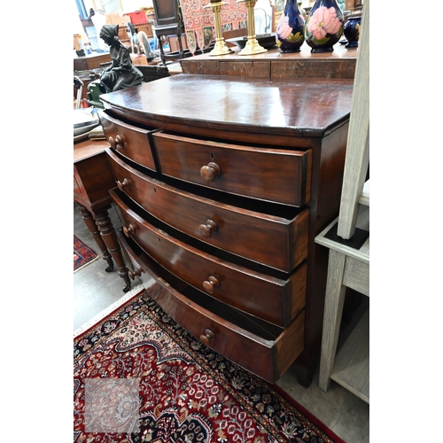 34 - A Victorian mahogany bowfront chest of two short over three long graduating drawers on splayed brack... 