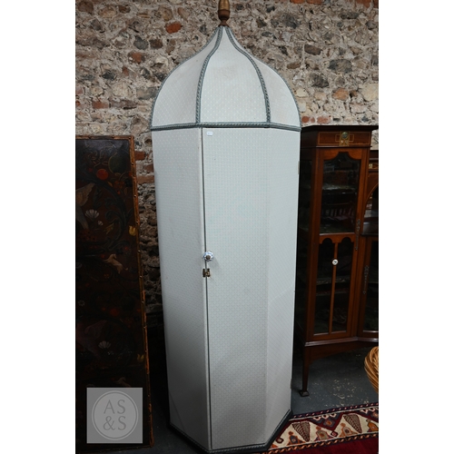 382 - A pair of octagonal 'Campaign tent' cupboards with wooden dome top frames with quarter gilt acorn fi...