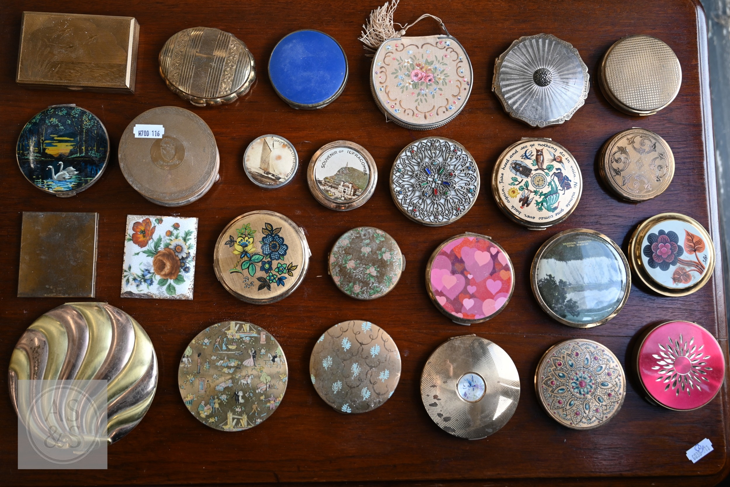 A collection of vintage base-metal powder compacts