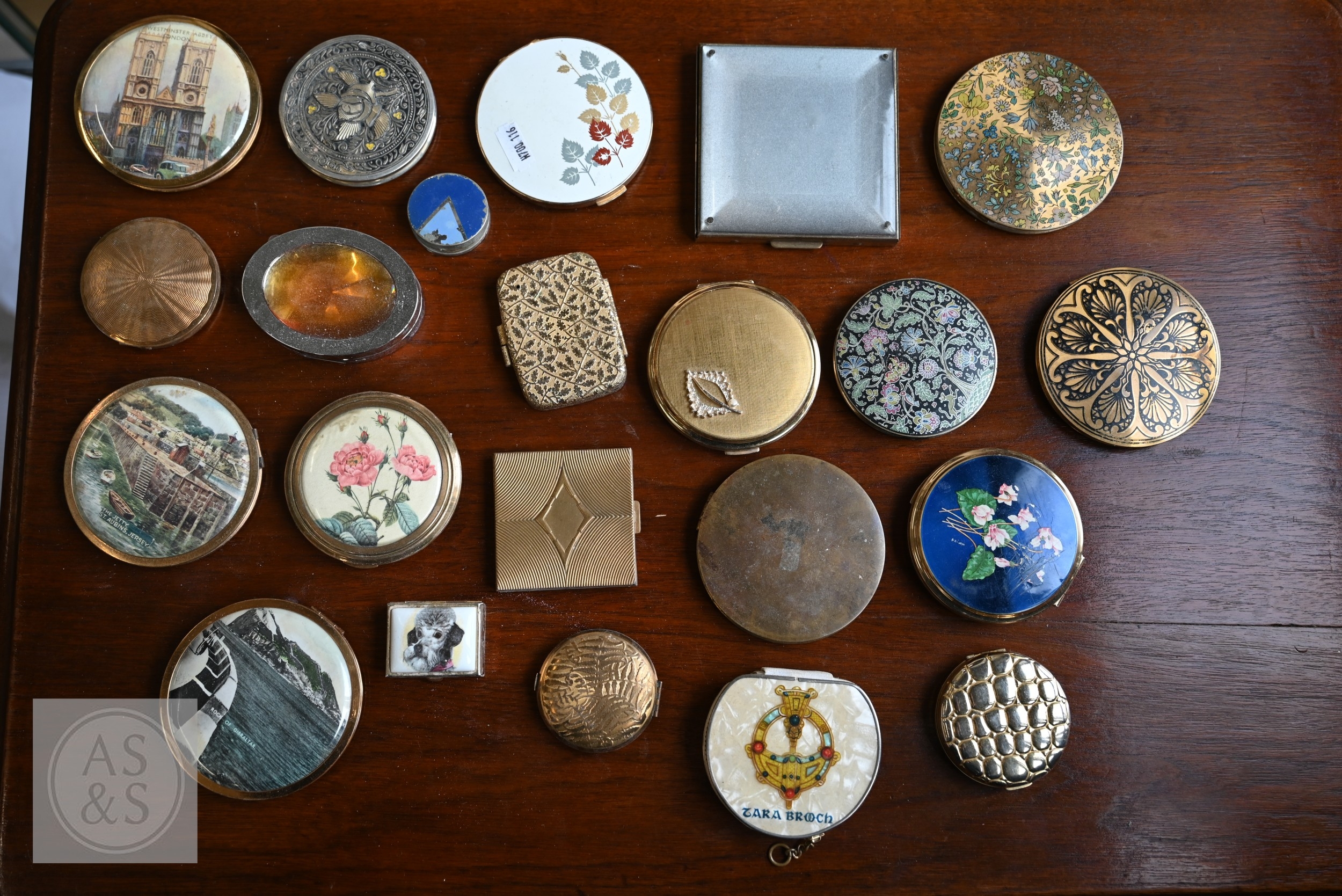 A collection of vintage base-metal powder compacts