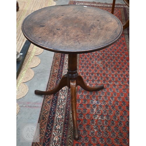 51 - A 19th century and later mahogany tilt-top occasional table with circular cross-banded top on turned... 
