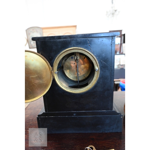 53 - A 1920s HAC tambour oak cased three-train mantel clock, 28 cm high to/w a late 19th century french s... 