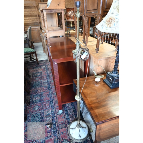 383 - A gilt metal neoclassical standard lamp on marble base with lion paw feet, 140 cm high to/w bronzed ... 