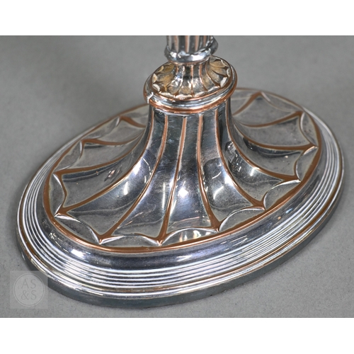 14 - A pair of plated on copper Adam Revival twin-branch candelabra, each with three sconces, on fluted o... 