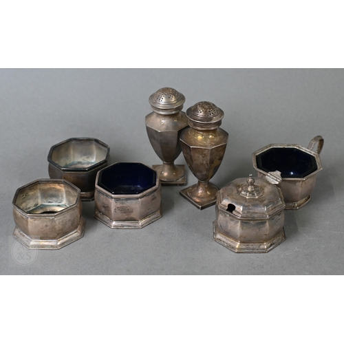 15 - An octagonal silver seven-piece condiment set, Birmingham 1927/32, 8.6ozt net of glass liners (a/f)t... 