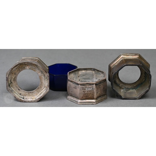 15 - An octagonal silver seven-piece condiment set, Birmingham 1927/32, 8.6ozt net of glass liners (a/f)t... 