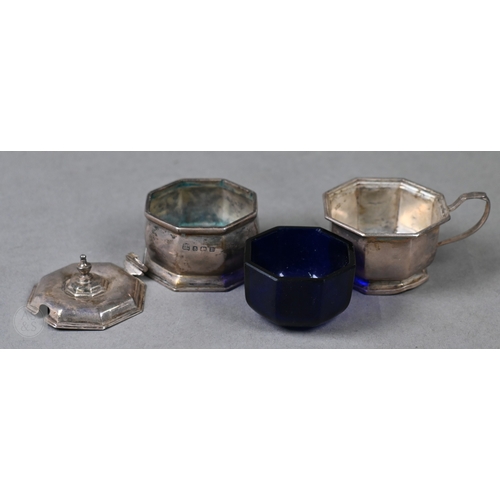 15 - An octagonal silver seven-piece condiment set, Birmingham 1927/32, 8.6ozt net of glass liners (a/f)t... 