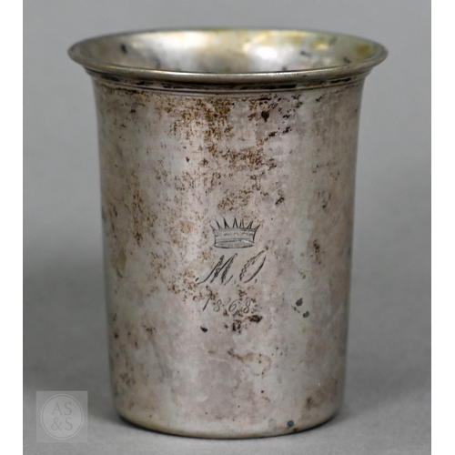 23 - A heavy quality silver pear-shaped cream jug in the Georgian manner, with scroll handle and shell fe... 