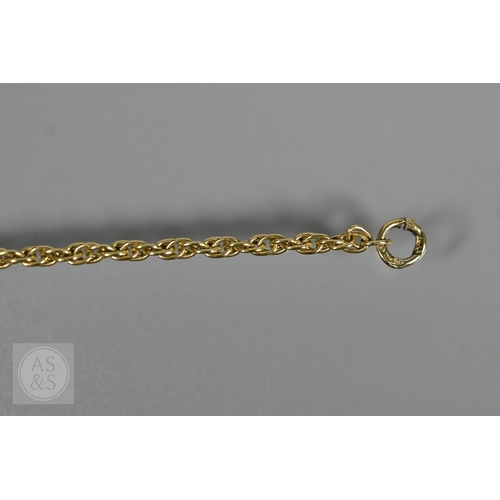 A 9ct yellow gold necklace with eight open scroll links to centre, 45 ...