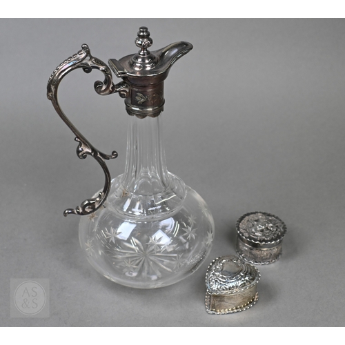 29 - A late Victorian silver heart-shaped trinket box with embossed scroll decoration to the hinged top, ... 