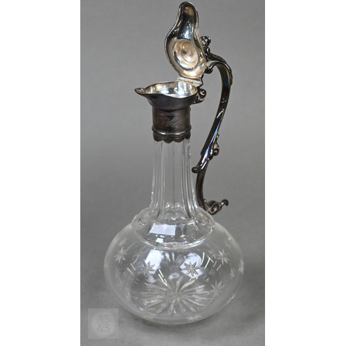 29 - A late Victorian silver heart-shaped trinket box with embossed scroll decoration to the hinged top, ... 