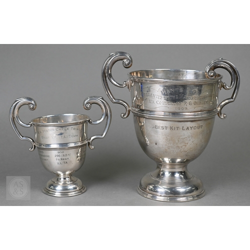 30 - Two silver trophy cups with twin handles and stemmed bases, Birmingham 1906/London 1947, 18ozt total... 