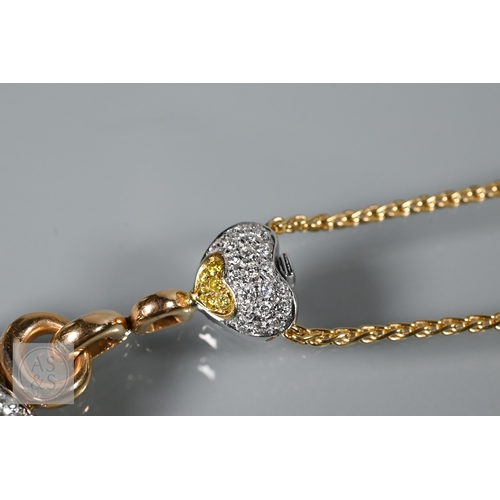 388 - A diamond pendant on chain and earring suite, the double heart drop pendant pavé set with round bril... 