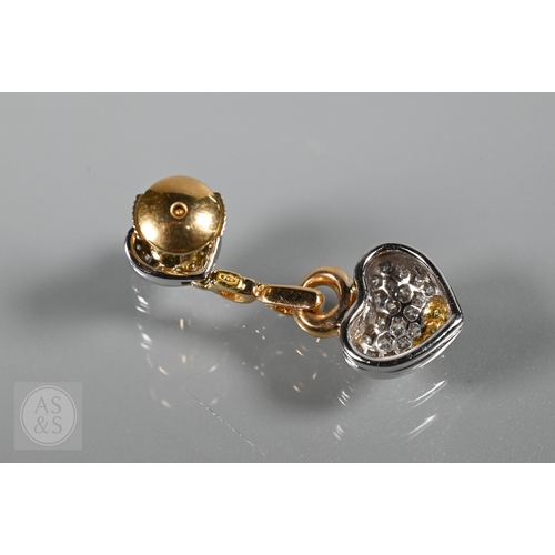 388 - A diamond pendant on chain and earring suite, the double heart drop pendant pavé set with round bril... 