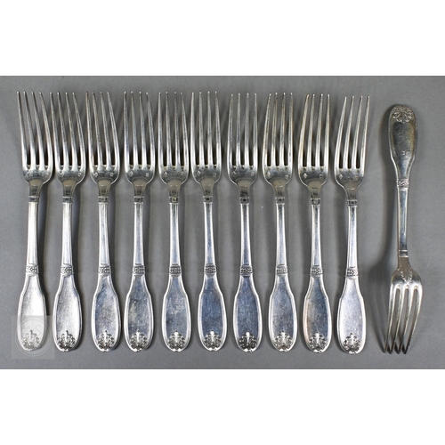 44 - A set of eleven French .950 grade table forks, the Art Deco style handles with honeysuckle finials, ... 