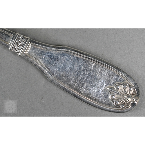 44 - A set of eleven French .950 grade table forks, the Art Deco style handles with honeysuckle finials, ... 