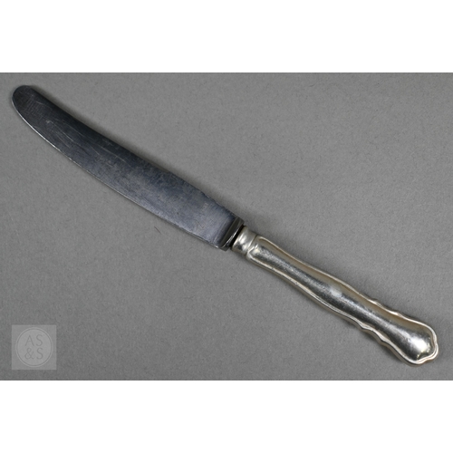 45 - A part set of German .800 grade flatware, 20 pieces, 35ozt, to/w a matching tea knife, M.H. Wilkens ... 