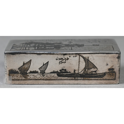 49 - An antique Egyptian unmarked (and untested) white metal snuff box with niello decoration of Nile vie... 
