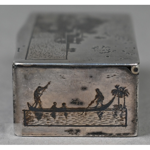 49 - An antique Egyptian unmarked (and untested) white metal snuff box with niello decoration of Nile vie... 