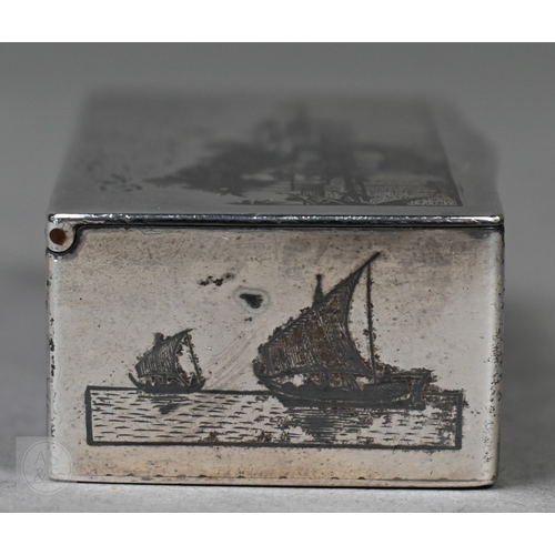 49 - An antique Egyptian unmarked (and untested) white metal snuff box with niello decoration of Nile vie... 