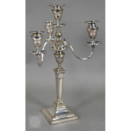 5 - A pair of late Victorian/Edwardian Adam Revival three-branch candelabra, each with four urn-shaped s... 