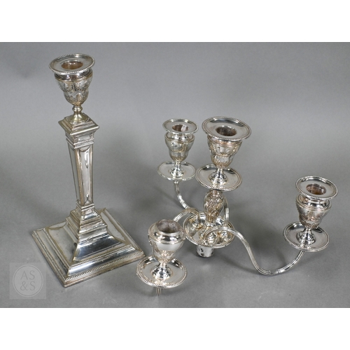 5 - A pair of late Victorian/Edwardian Adam Revival three-branch candelabra, each with four urn-shaped s... 