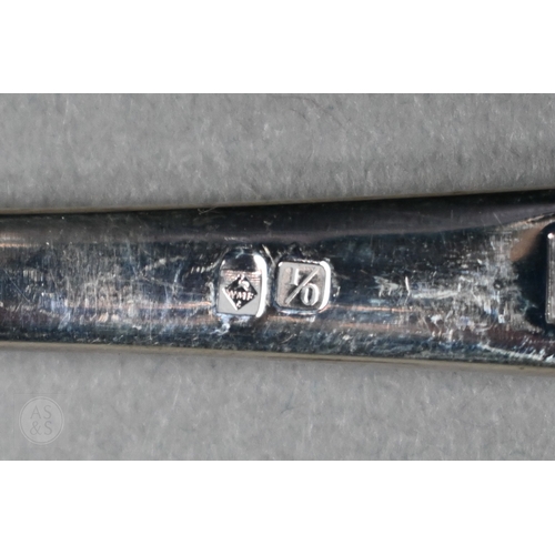 51 - A set of six German .800 grade table forks and two matching serving spoons and a fork with vestigial... 