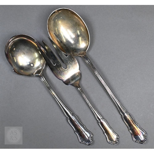 51 - A set of six German .800 grade table forks and two matching serving spoons and a fork with vestigial... 