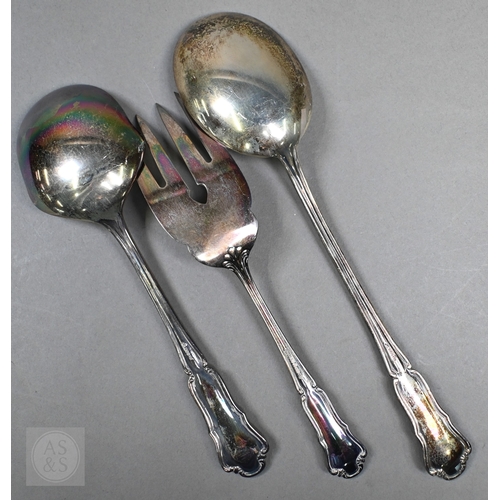 51 - A set of six German .800 grade table forks and two matching serving spoons and a fork with vestigial... 
