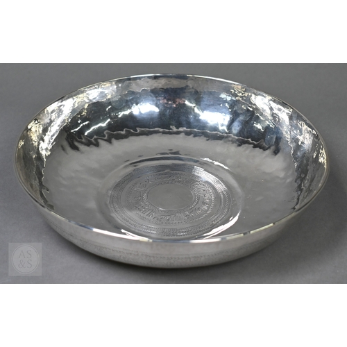 53 - A vintage Middle Eastern white metal bowl with calligraphic central roundel, 14.2ozt, 23cm diameter