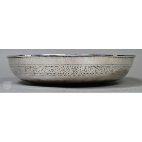 53 - A vintage Middle Eastern white metal bowl with calligraphic central roundel, 14.2ozt, 23cm diameter