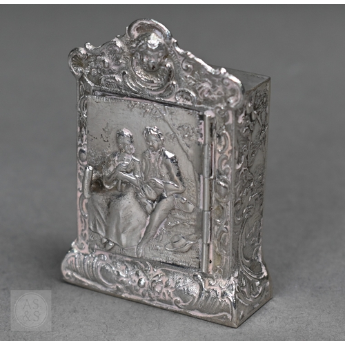 55 - A Continental .800 grade ornate pierced bowl, embossed and chased with Bacchanalian putti, 20cm wide... 