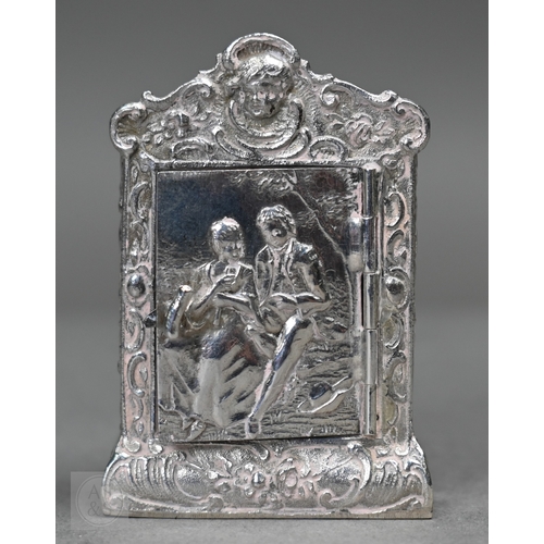 55 - A Continental .800 grade ornate pierced bowl, embossed and chased with Bacchanalian putti, 20cm wide... 