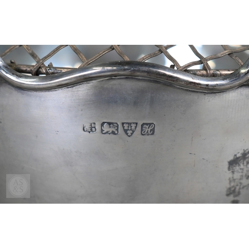 59 - An Edwardian silver rose bowl with shaped rim and raised foot, Barker Brothers, Chester 1908, 13.2oz... 