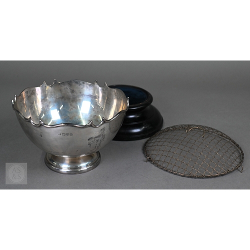 59 - An Edwardian silver rose bowl with shaped rim and raised foot, Barker Brothers, Chester 1908, 13.2oz... 