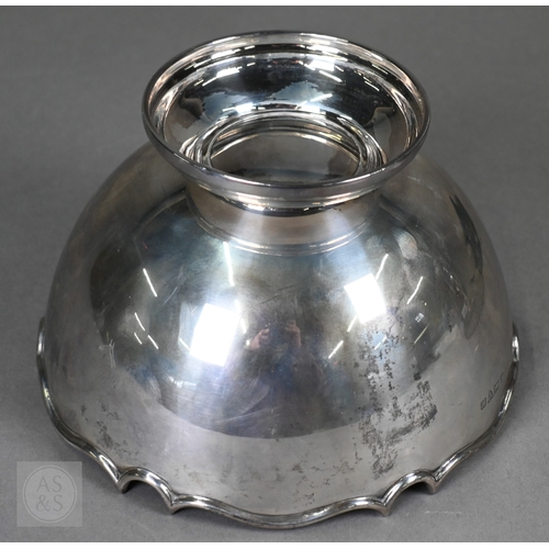 59 - An Edwardian silver rose bowl with shaped rim and raised foot, Barker Brothers, Chester 1908, 13.2oz... 