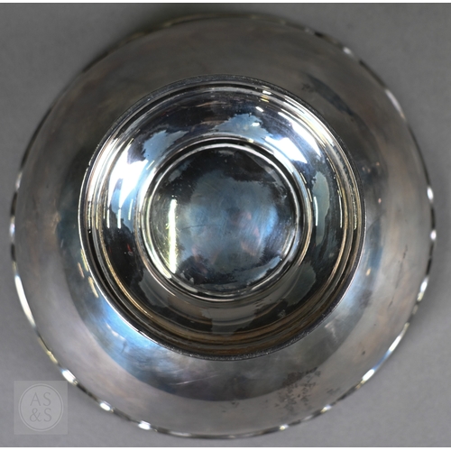 59 - An Edwardian silver rose bowl with shaped rim and raised foot, Barker Brothers, Chester 1908, 13.2oz... 