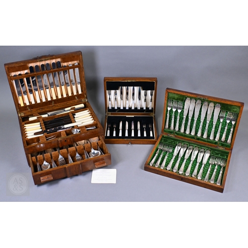6 - An Edwardian oak-cased set of twelve each Albany pattern fish knives and forks with silver handles a... 