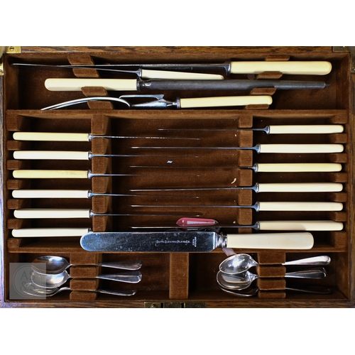 6 - An Edwardian oak-cased set of twelve each Albany pattern fish knives and forks with silver handles a... 