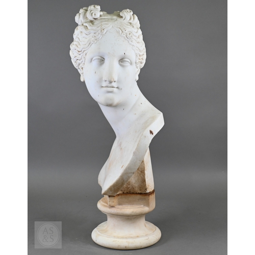 888 - An antique white marble bust of a classical female with ornate hair, on socle base, 62cm high